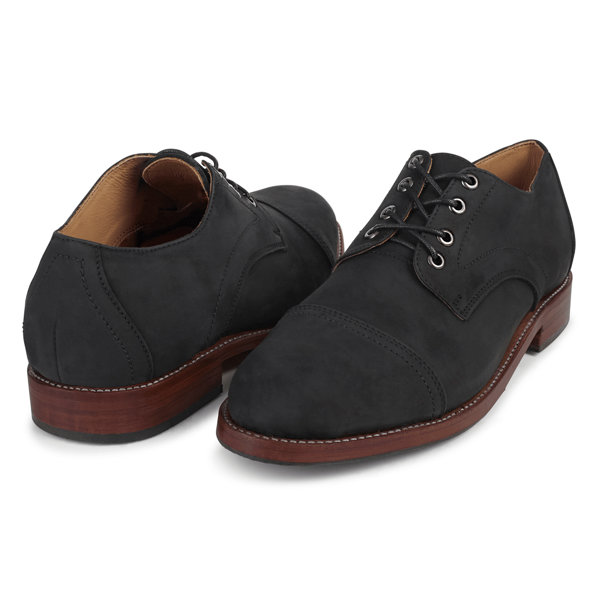 Pair of men's EEEEE extra-wide black leather cap-toe derbies, shown from the front at an angle, each pair made to order – The Marco