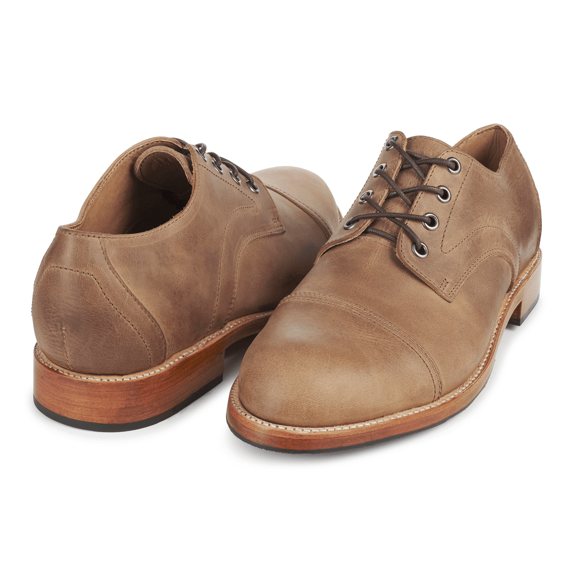 Men's 4E-wide tan leather cap-toe derbies, shown from the front at an angle. Handcrafted to order in Guatemala – The Marco