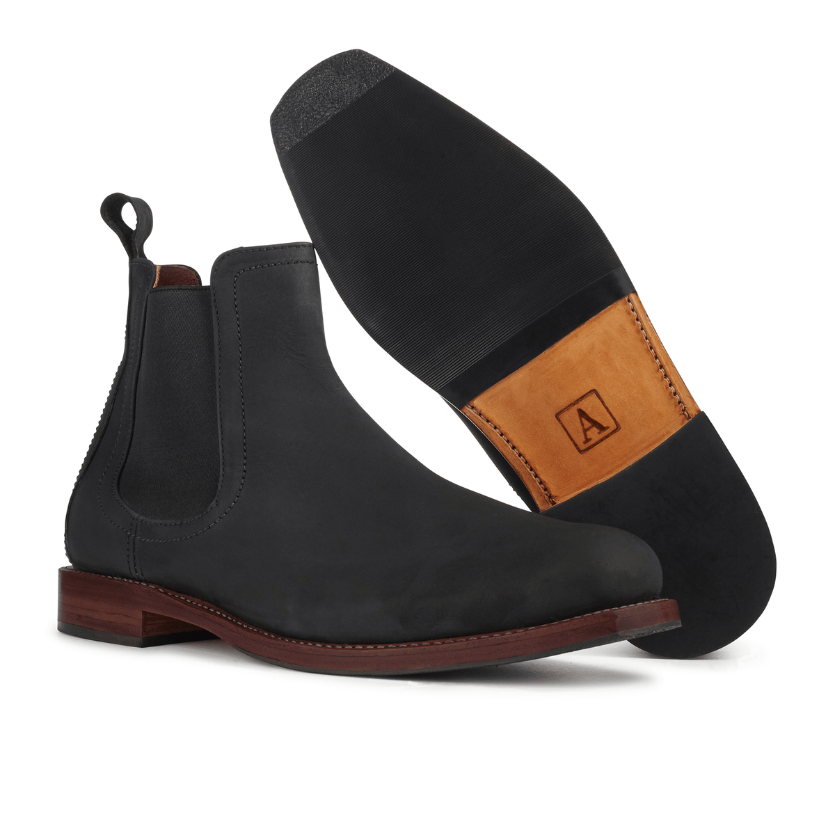 Men's 2E-wide black leather Chelsea boot, showing the leather sole. Handcrafted to order in Guatemala – The Mendoza