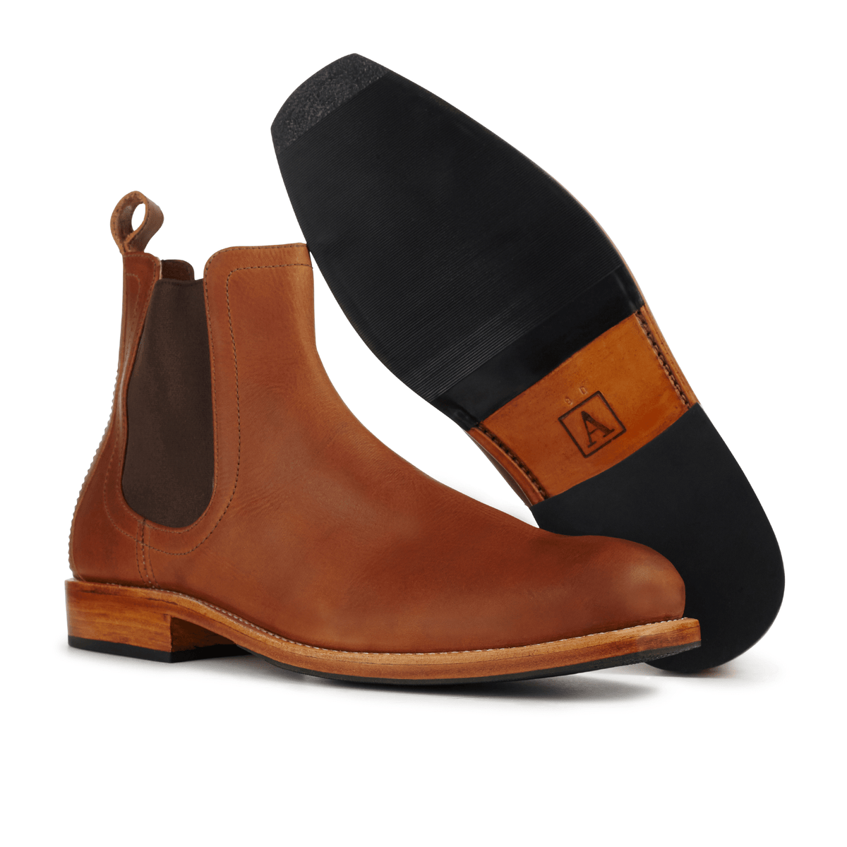 Men's 3E-wide light brown leather Chelsea boot, shown with the sole turned up, can be made in size 16 – The Mendoza