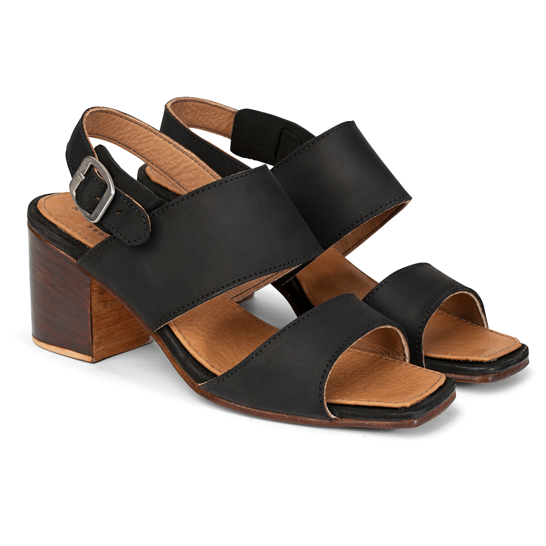 Women's 2E-wide black leather heeled sandals, shown at an angle, also made for size 6 feet – The Serena