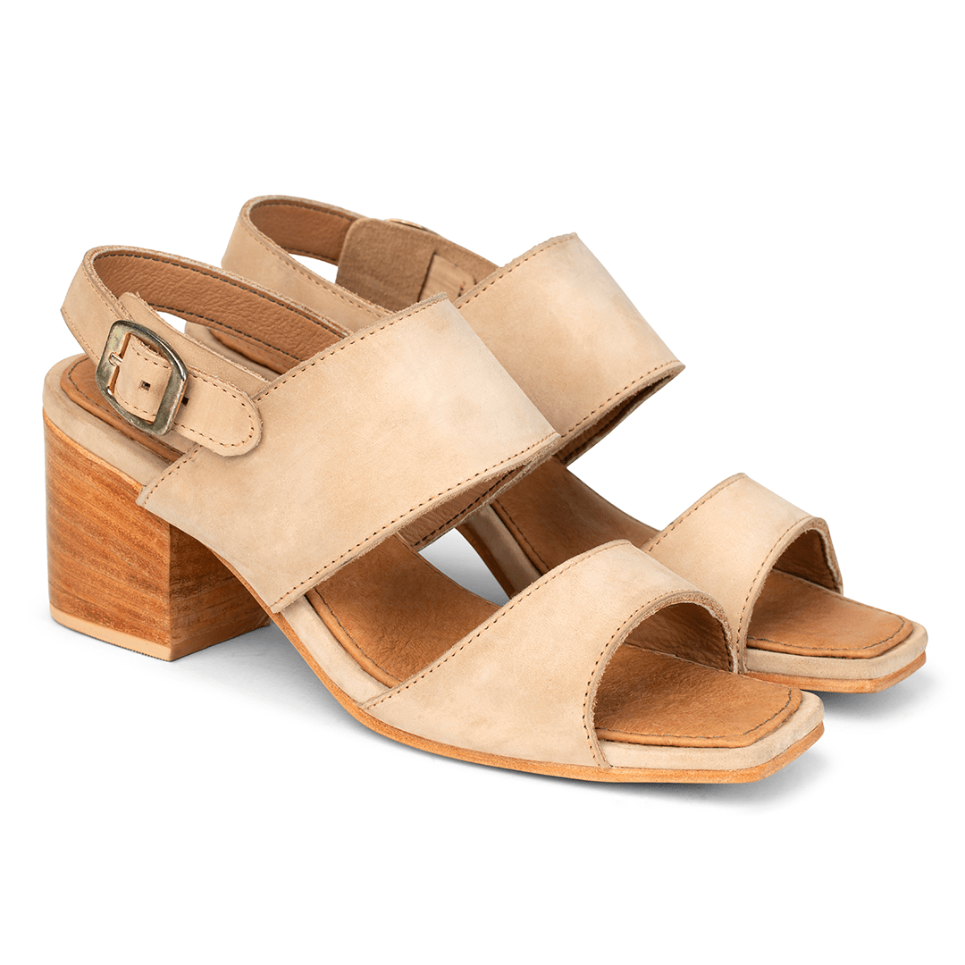 Women's 2E-wide cream leather heeled sandals, shown at an angle, can be made in size 13 – The Serena