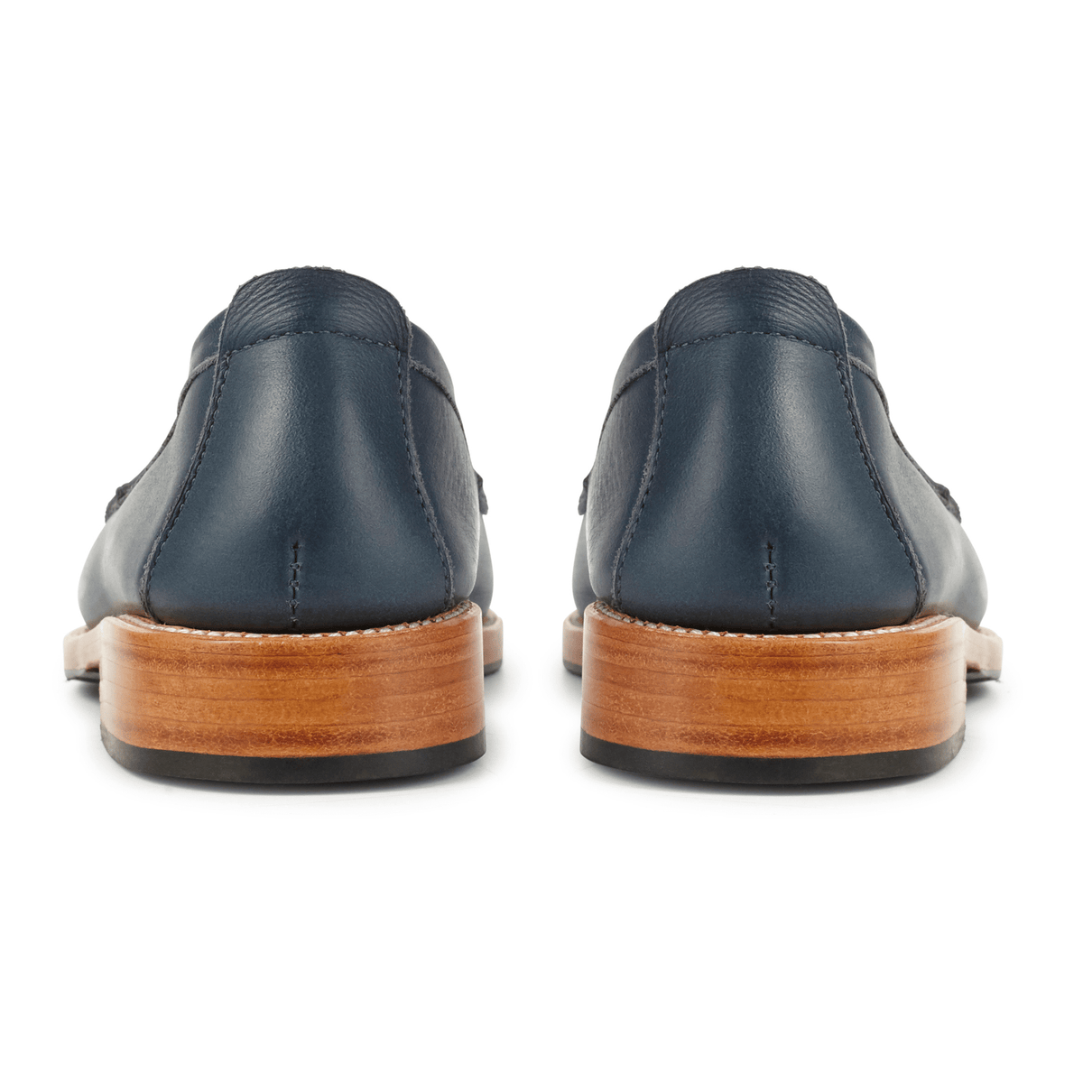 Back view of women's dark leather penny loafers with stacked wood soles, available in narrow to extra wide widths