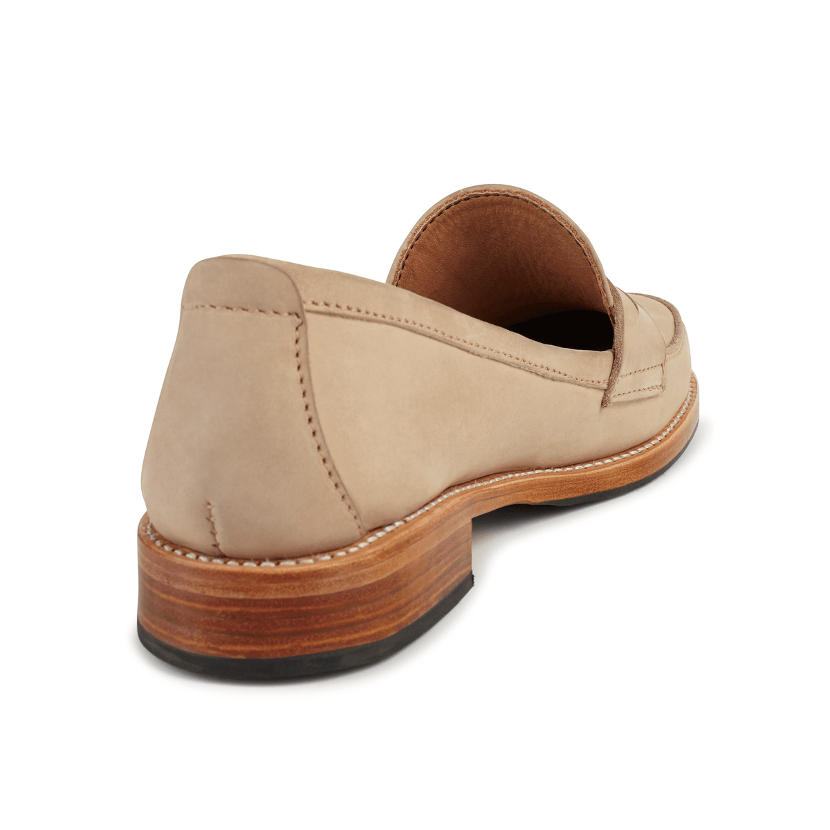 Tan women's leather penny loafer with a stitched welt and stacked wood heel, handcrafted by Adelante Made-To-Order