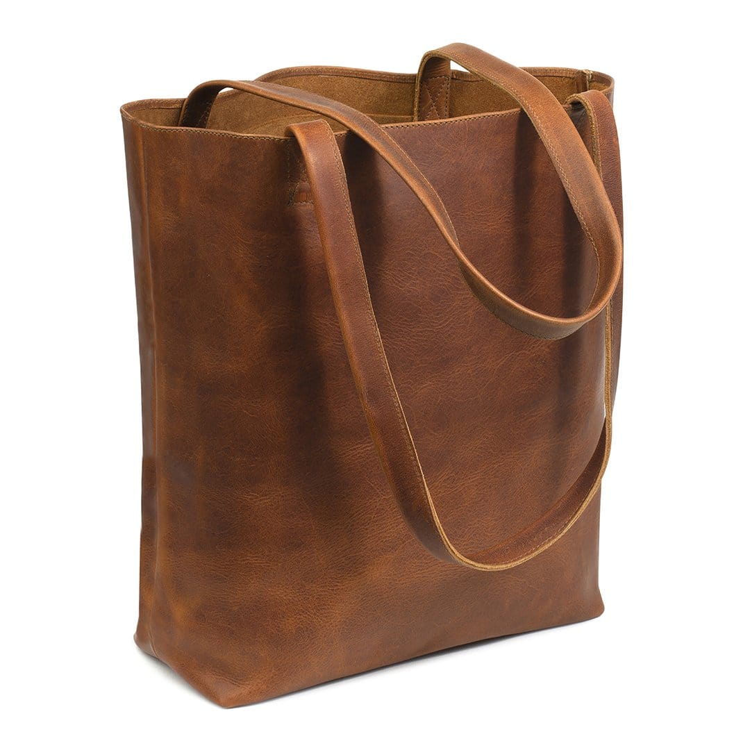 Light brown leather tote bag, shown at an angle, handcrafted to order in Guatemala