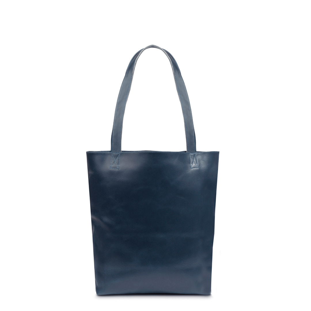 Blue leather tote bag, front view, made to order in Guatemala