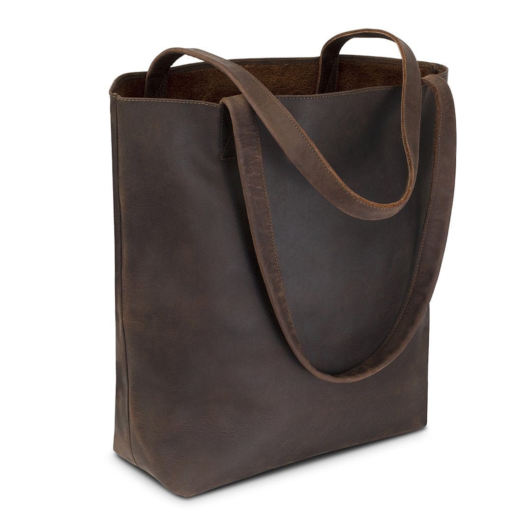Dark brown leather tote bag, shown at an angle, handcrafted and made to order