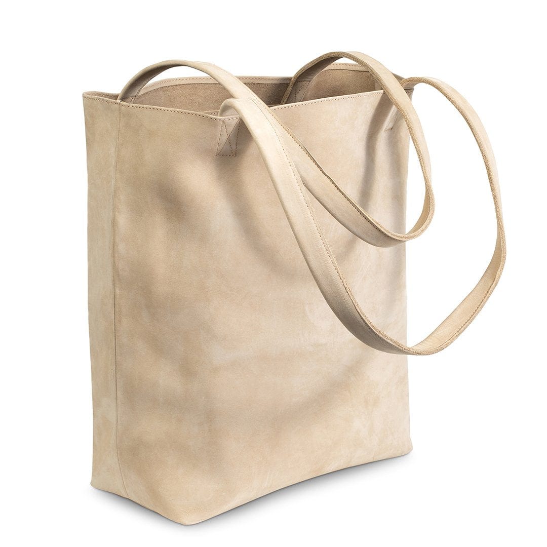 Cream leather tote bag, shown at an angle, handcrafted to order in Guatemala